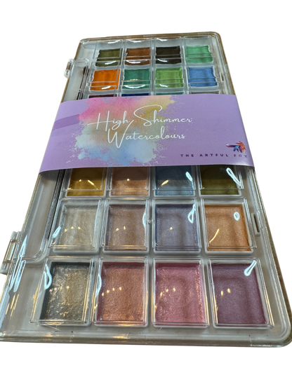 High Shimmer Watercolours by The Artful Fox. 28 pearlescent pastel paints for hobbyists and children, perfect for adding some sparkle to your artwork. Paintbrush included. Storage case with palette lid for mixing your perfect shimmering shade