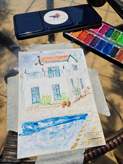 Children's and beginner's watercolour paint set by The Artful Fox. With 24 vibrant colours, in attractive tin with palette lid. Includes paintbrush! The perfect educational gift for the hobby artist in your life