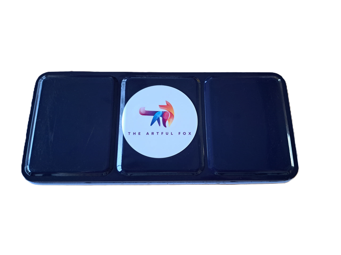 Children's and beginner's watercolour paint set by The Artful Fox. With 24 vibrant colours, in attractive tin with palette lid. Includes paintbrush! The perfect educational gift for the hobby artist in your life