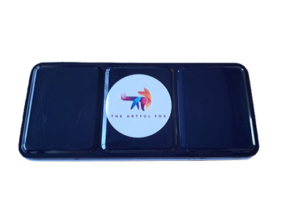 Children's and beginner's watercolour paint set by The Artful Fox. With 24 vibrant colours, in attractive tin with palette lid. Includes paintbrush! The perfect educational gift for the hobby artist in your life