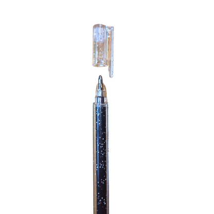 Black glittery pen with cap on a white background