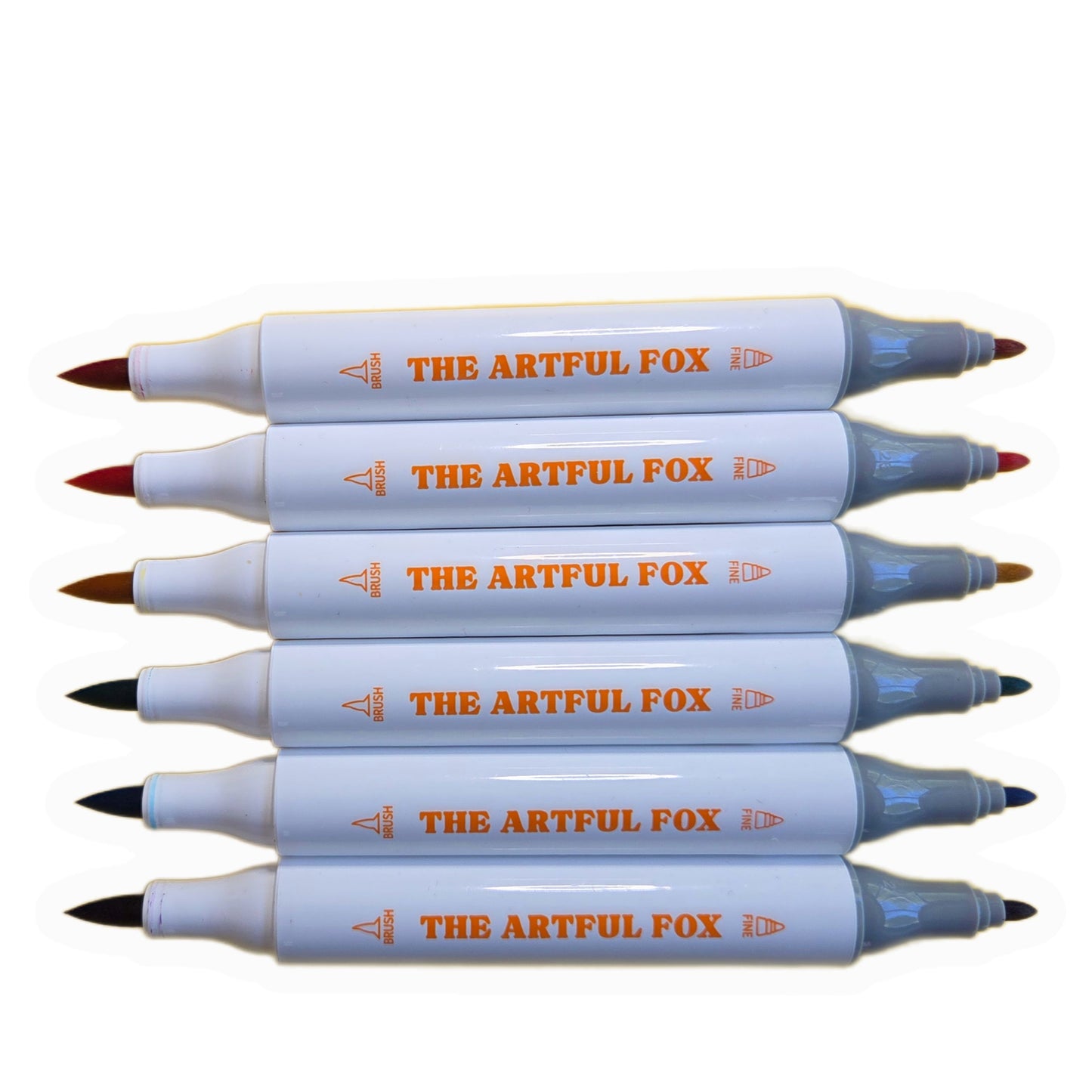 dual tip alcohol marker pens with lids removed showing coloured brush tips and fine tips by The Artful Fox
